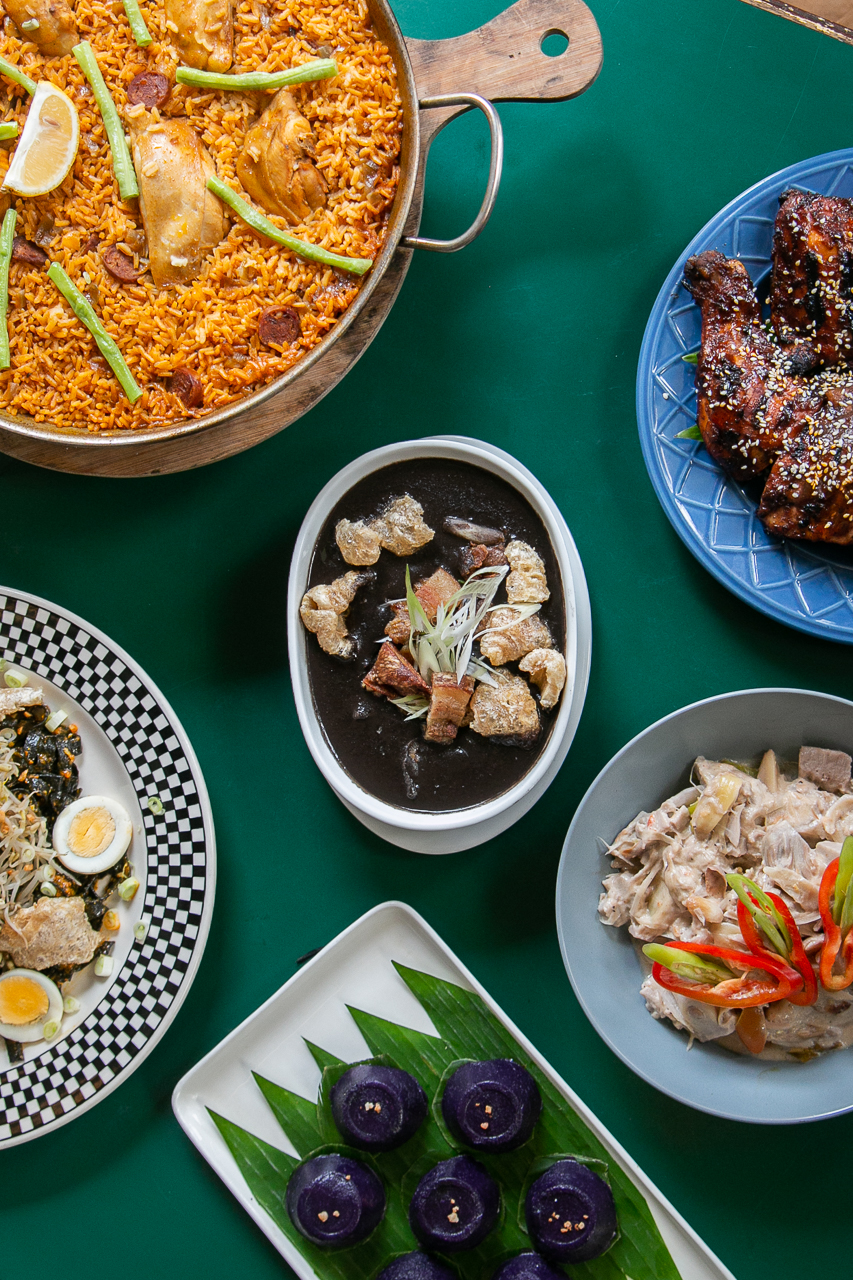 Paella Valenciana, grilled chicken sinampalukan, Cavite express, pancit estacion negra, and crispy dinuguan, and salted egg-stuffed rice cake