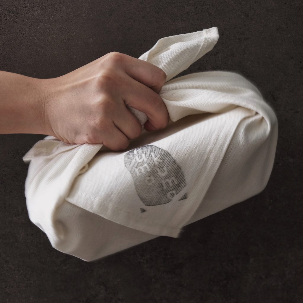 Kumakuma Curry employs the traditional Japanese custom of furoshiki-wrapping