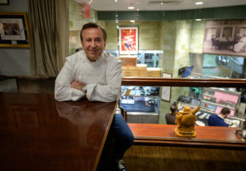 French chef and restaurateur Daniel Boulud poses for a photo in the office of his restaurant 'Daniel', in Manhattan, New York City on November 19, 2021