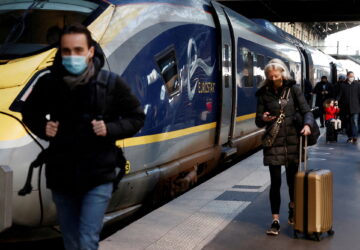 FILE PHOTO: Passengers arrive at the Eurostar terminal at Gare du Nord train station, after France eased travel restrictions for travelers from Britain amid the spread of the coronavirus disease (COVID-19) pandemic